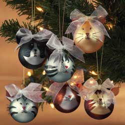 Add a touch of festive fun to your Christmas tree with our cheery feline glass baubles with ribbon
