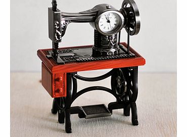 This Sewing Machine Miniature Clock Gift for Her would make a fabulous gift for any lady that has a passion for sewing.This miniature clock has been cleverly designed to look just like an old fashioned sewing machine  It has a dark silver finish has 