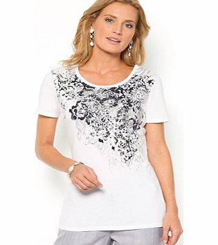 This Anne Weyburn T-shirt ticks all the right boxes with its fabulous block motif and fancy little stud detailing. It has a round scoop neckline. Block motif on the front accentuated by studs. The length of this ladies T-shirt is: 25 1/4in. (64cm).