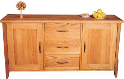 This spacious oak sideboard from our Wealden range has two doors and three drawers with cast metal