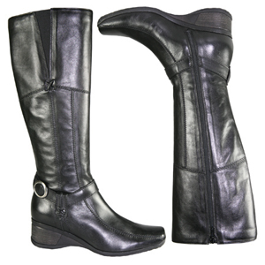 A knee length boot from Jones Bootmaker. Features small wedge heel, decorative strap with metal ring