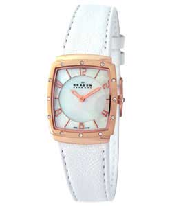 Mother of pearl dial.Square rose gold case with stones.Adjustable white strap.Manufacturers 3 year g