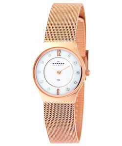 Quartz.White mother of pearl dial.Round stainless steel case.Adjustable rose gold mesh strap.Water r