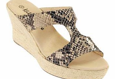Snake print never fails to impress and these mules are no different. Ideal to wear with jeans and a tunic. A fab summer pair of shoes.Mules Features: Upper: Other materials Lining and sock: Leather Sole: Other materials Heel height approx. 8 cm (3 i