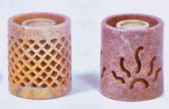 these incense holders are a round box with sun rays carved into the side, they come with an insert