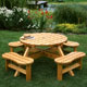 Enjoy dinner and drinks in style with this round pine picnic table