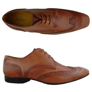 A modern 3 eyelet Derby shoe from Jones Bootmaker. With wing tip brogue detail to front and punch de