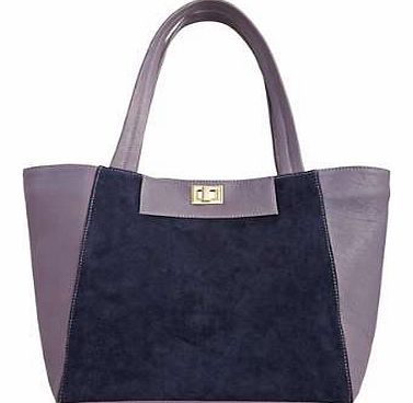 What a great way to stand out in the crowd with this beautiful bag. The mix of suede and leather materials is what makes it so different. In a large size, it will fit everything in but still remains stylish for the season. Twist lock feature.Bag Feat