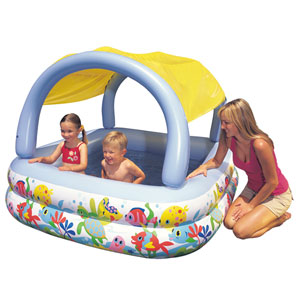 A square-shaped inflatable pool for younger children, which includes a removable shade to keep them 