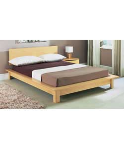Beech effect double bedstead with solid slats. Includes firm mattress. Size (W)161, (L)210,