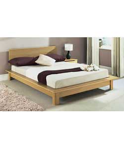 Oak effect double bedstead with solid slats. Includes firm mattress. Size (W)161, (L)210, (H)75cm