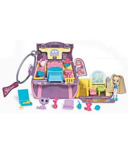 Fabulous Fashion Purse playset and exclusive doll with real hair for you to style!Purse magically op