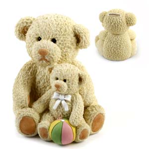 A really cute teddy bear money box  perfect for a christening or new born gift. It would look adorab