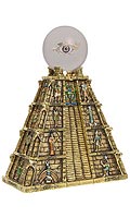 Pyramid-style temple with images of the gods in relief. Height: 22 cms