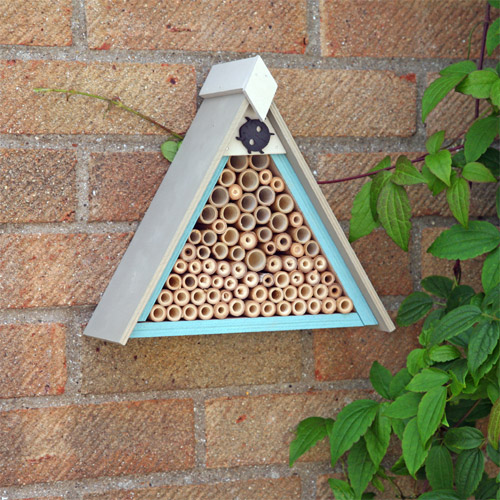 Enhance any garden or patio with this lovely  wooden wall mounted Ladybird house.