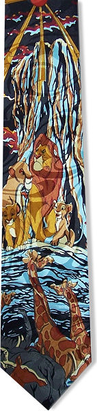 A great tie for Lion King fans, featuring the lion family on a rocky outcrop, and the other animals