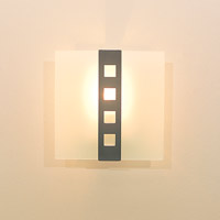 Stunning and simple, this contemporary wall light