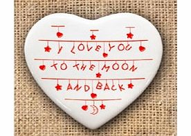 Show someone you care with this romantic keepsake. Made from ceramic, this heart shaped keepsake makes a beautiful gift for someone you adore. With the words I love you to the moon and back printed across the front, this gift is bound to impress. Loc