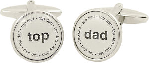 A lovely set of silver framed cufflinks with Top and Dad in black on a white coated background.