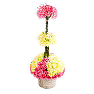 This elegant and contemporary topiarised design in Carnations will be the talking point at any dinne