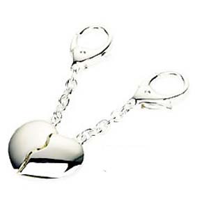 A superb gift for any special occasion. This two heart silver plated keyring can have a name on