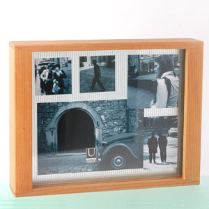 The Ether Frame is a stained and lacquered wood frame with multiple glass layers that holds a