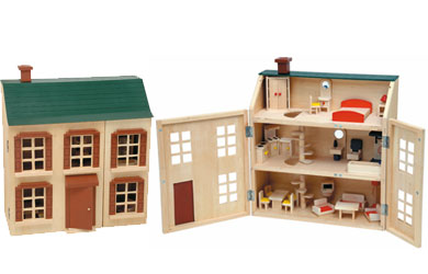 A sweet traditional wooden dolls house with furniture!