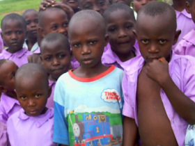 Unbranded Volunteer with children in Uganda