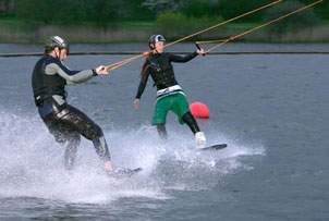 Wakeboarding is an exciting mix of snowboarding, surfing and skateboarding. Towed by a cable, you ar