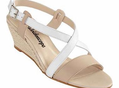 On trend wedge leather sandal with a stylish cross over strap detail. Sandal Features: Upper: leather Lining: Textile Sock and sole: Other Heel height approx. 6 cm (2 ins) This item is part of our exclusive Spring 2015 range, due to launch in January