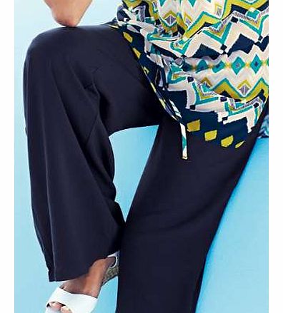 Taking inspiration from traditional fisherman pants, this wide leg beach trouser is an easy summer piece. The soft feel viscose trouser is an ideal alternative to the kaftan or sarong, the elasticated waist makes it easy and versatile. Why not be dar