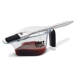 Available Next Day from Rawgarden  the Weber barbeque Sauce Boat and brush has a silicon brush with 